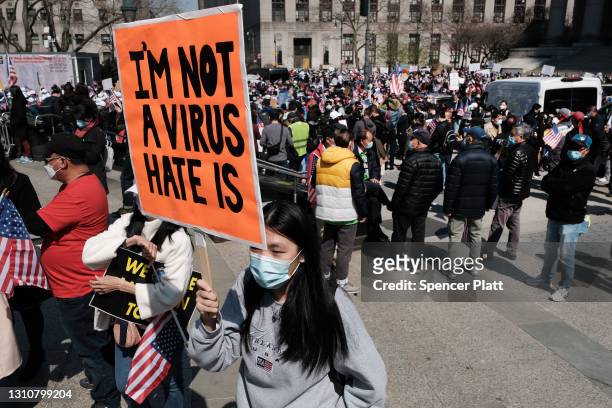 People participate in a protest to demand an end to anti-Asian violence on April 04, 2021 in New York City. The group, which numbered near 3000 and...