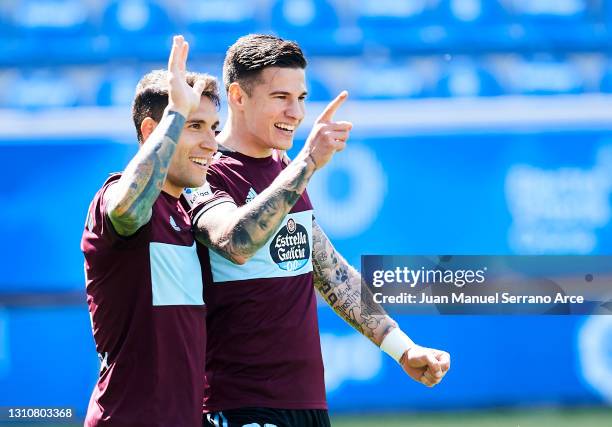 Santi Mina of Celta de Vigo celebrates with his teammates Hugo Mallo of Celta de Vigo after scoring his team's second goal during the La Liga...