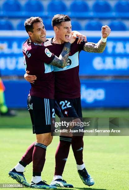 Santi Mina of Celta de Vigo celebrates with his teammates Hugo Mallo of Celta de Vigo after scoring his team's second goal during the La Liga...