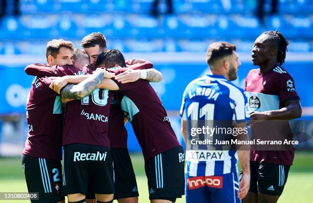 Santi Mina of Celta de Vigo celebrates with his teammates Hugo Mallo, Iago Aspas and Manuel Agudo "Nolito" of Celta de Vigo after scoring his team's...
