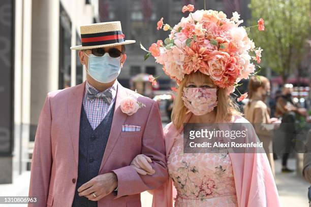 People wearing costumes participate in the Easter Bonnet parade on Easter Sunday amid the coronavirus pandemic on April 4, 2021 in New York City. Due...