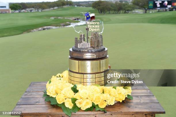 The trophy and cowboy boots are seen on the 18th green during the final round of Valero Texas Open at TPC San Antonio Oaks Course on April 04, 2021...