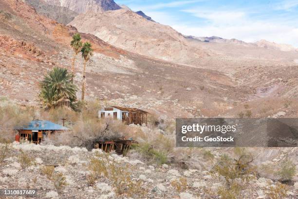 scene of a ghost talc mining camp near death valley - soapstone stockfoto's en -beelden