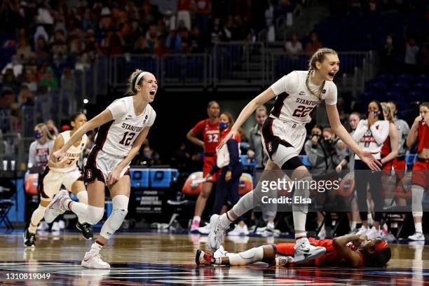 Cameron Brink of the Stanford Cardinal and Lexie Hull of the Stanford Cardinal celebrate a win against the Arizona Wildcats in the National...