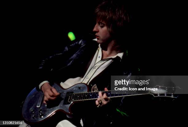 English rock guitarist, songwriter James Honeyman-Scott , of the English-American rock band The Pretenders, plays on stage during The Pretenders II...