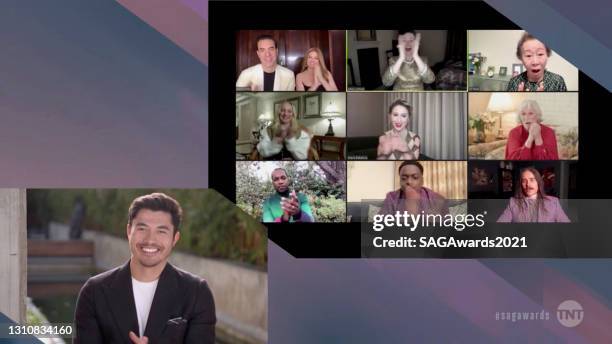 In this screengrab released on April 4 Henry Golding, Sacha Baron Cohen, Isla Fisher, Olivia Colman, Yuh-Jung Youn, Helena Zengel, Maria Bakalova,...