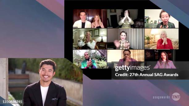 In this screengrab released on April 4 Henry Golding, Sacha Baron Cohen, Isla Fisher, Olivia Colman, Yuh-Jung Youn, Helena Zengel, Maria Bakalova,...