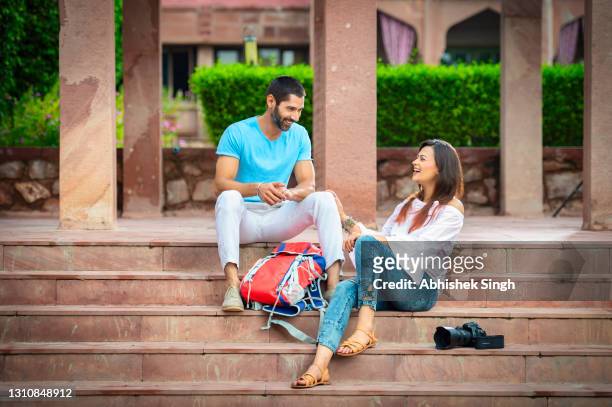 young indian couple - indian subcontinent ethnicity stockfoto's en -beelden