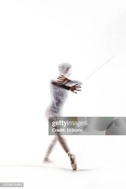 bailarina elegante bailando con nylon transparente - legs in nylon fotografías e imágenes de stock