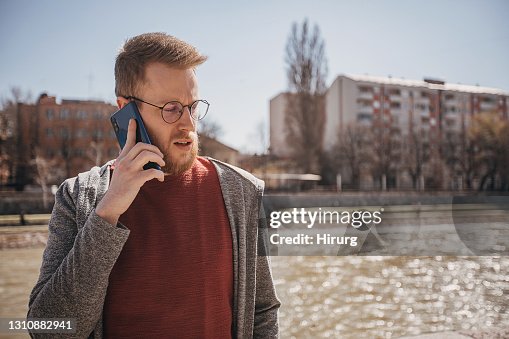 Young Man By The River High-Res Stock Photo - Getty Images