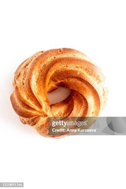 choux pastry ring filled with cream isolated on white background - choux pastry stock pictures, royalty-free photos & images