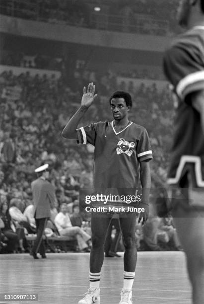 Denver Nuggets forward David Thompson waits for a ball during the warmup of an ABA basketball game with the New York Nets at McNichols Arena on...