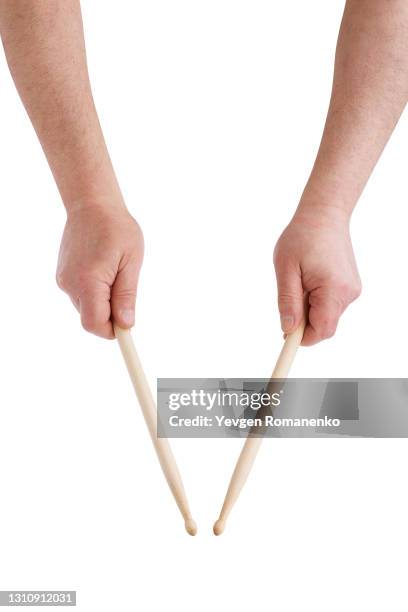 drumsticks in hands isolated on white background - drums white background stock pictures, royalty-free photos & images