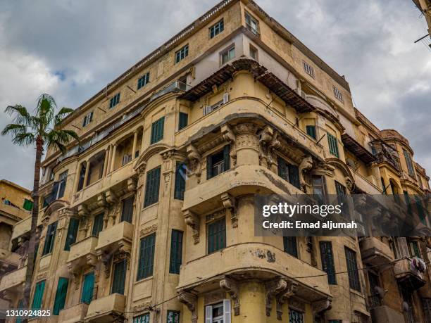 rundown old colonial buildings in alexandria, egypt - alexandria egypt stock pictures, royalty-free photos & images