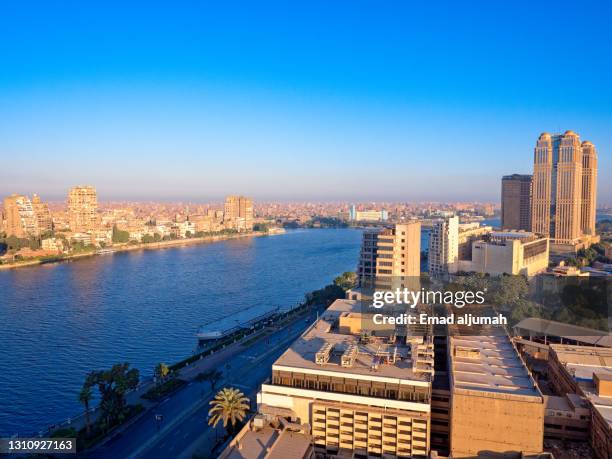 cairo's skyline along nile river, cairo, egypt - aerial view of cairo stock pictures, royalty-free photos & images