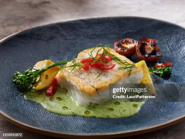 pan seared halibut with a dill and buttermilk sauce - halibut stock pictures, royalty-free photos & images