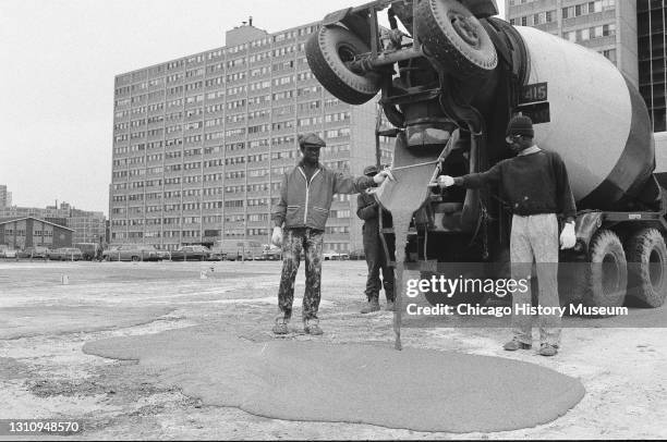 Cabrini-Green tennis court concrete poured, Cabrini-Green Community Sandlot Tennis Club, Chicago, Illinois, March 11, 1977.