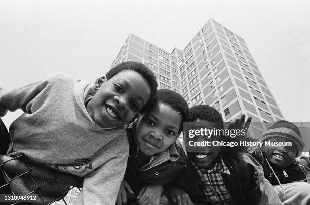 Interior and exterior scenes of residents of Stateway Gardens and Cabrini-Green housing projects, Chicago, Illinois, June 25, 1976.