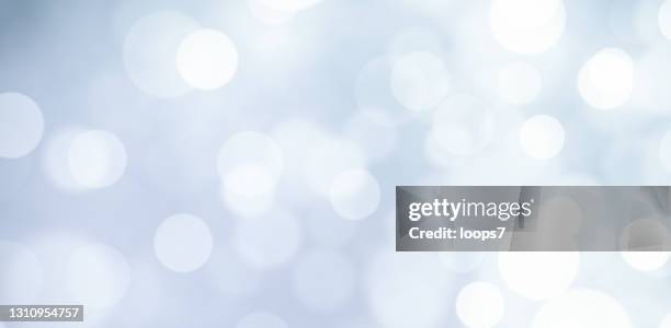 delicate defocused lights background - silver background stock illustrations