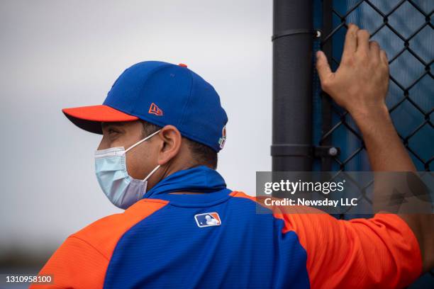 New York Mets manager Luis Rojas wear face mask during a spring training workout on February 24 in Port St. Lucie, Florida.