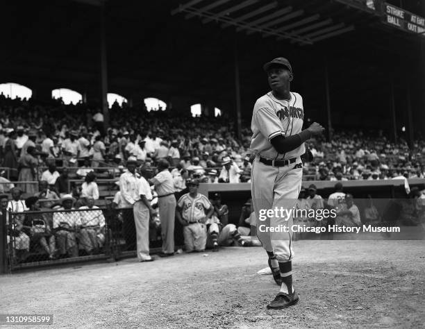 Baseball player Satchel Paige warms up before the East-West Negro American League All-Star Game at Comiskey Park, Chicago, Illinois, July 31 July 31,...