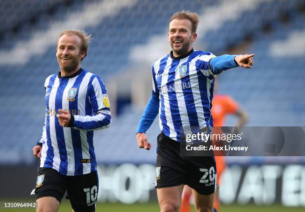 Jordan Rhodes of Sheffield Wednesday celebrates with team mate Barry Bannan after scoring their side's fourth goal during the Sky Bet Championship...