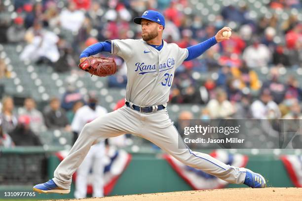 Starting pitcher Danny Duffy of the Kansas City Royals pitches during the first inning against the Cleveland Indians during the home opener game at...