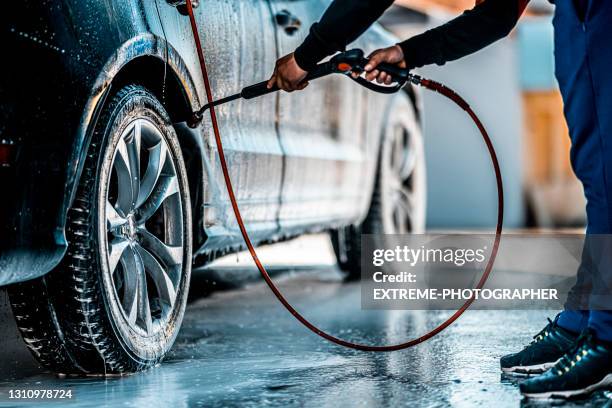 the washing process on a self service car wash - shiny car stock pictures, royalty-free photos & images