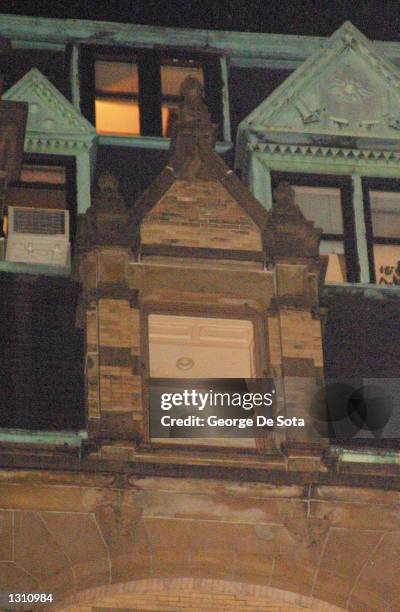 Candles burn in the window of Yoko Ono''s home at the Dakota apartments on the 20th anniversary of her late husband John Lennon''s murder December 8,...