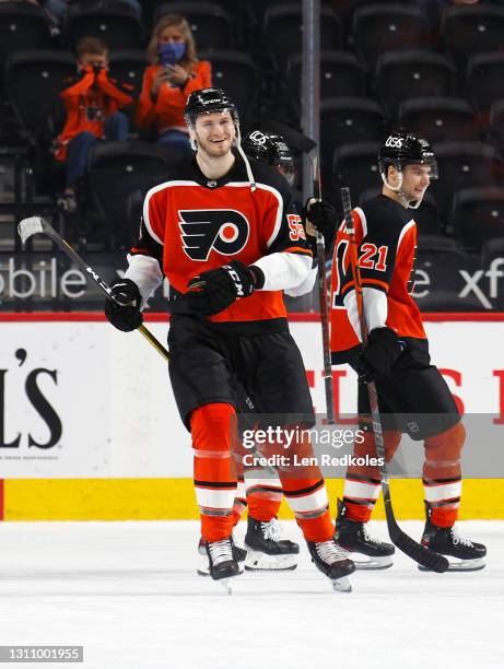 Samuel Morin of the Philadelphia Flyers reacts with Scott Laughton following his game-winning goal against the New York Rangers at the Wells Fargo...