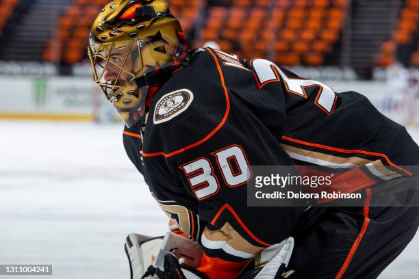 Goaltender Ryan Miller of the Anaheim Ducks looks on during warm-up before the game against the Arizona Coyotes at Honda Center on April 2, 2021 in...