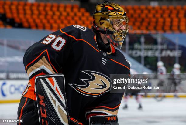 Goaltender Ryan Miller of the Anaheim Ducks looks on during warm-up before the game against the Arizona Coyotes at Honda Center on April 2, 2021 in...