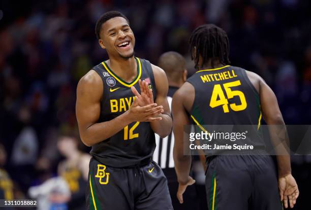 Jared Butler and Davion Mitchell of the Baylor Bears celebrate in the second half of the National Championship game of the 2021 NCAA Men's Basketball...
