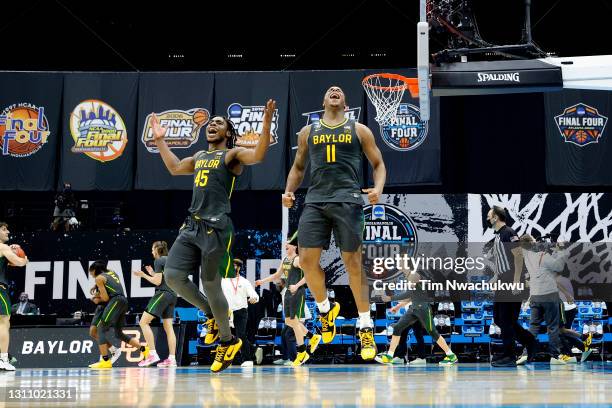 Davion Mitchell and Mark Vital of the Baylor Bears celebrate after winning the National Championship game of the 2021 NCAA Men's Basketball...