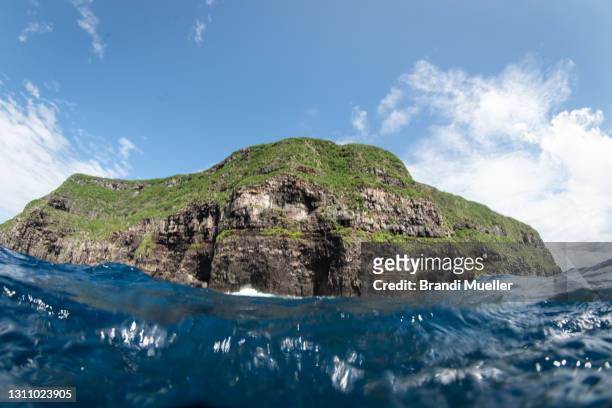wolf island from water in galapagos - galapagos stock pictures, royalty-free photos & images