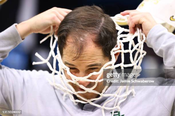 Head coach Scott Drew of the Baylor Bears places the net around his neck after their win against the Gonzaga Bulldogs in the National Championship...