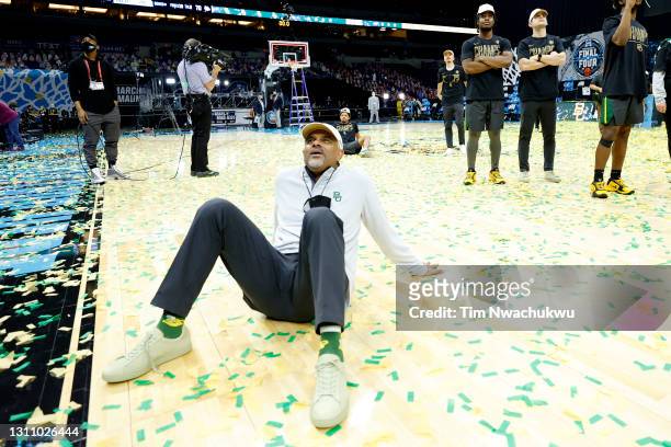 Associate Head Coach Jerome Tang of the Baylor Bears sits on the court after defeating the Gonzaga Bulldogs 86-70 in the National Championship game...