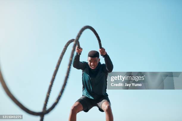 muscles loading, please wait - strong black man stock pictures, royalty-free photos & images