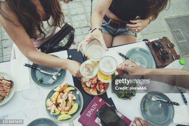 tapas in barcelona - patatas bravas stock pictures, royalty-free photos & images