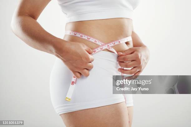 séance d’entraînement, votre tour de taille vous remerciera - tour de taille photos et images de collection