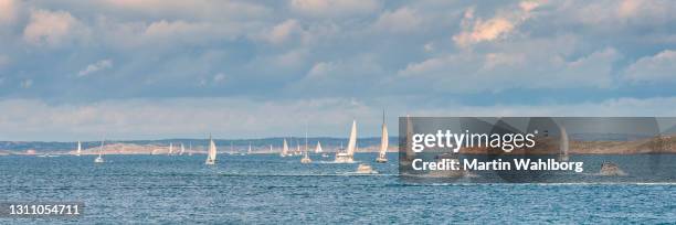 sailing at the swedish coastline - motorboat stock pictures, royalty-free photos & images