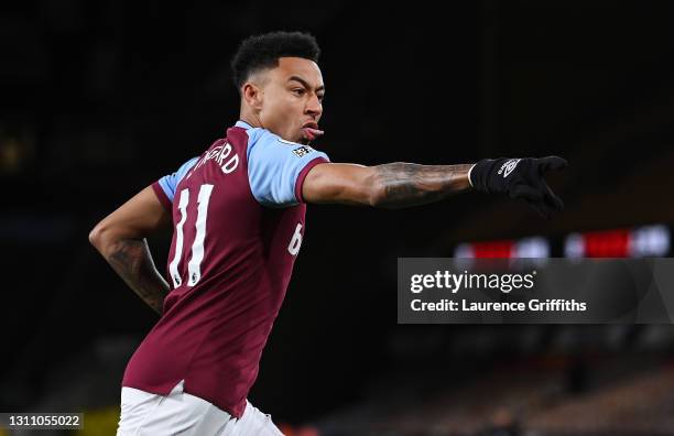 Jesse Lingard of West Ham United celebrates scoring his teams first goal during the Premier League match between Wolverhampton Wanderers and West Ham...