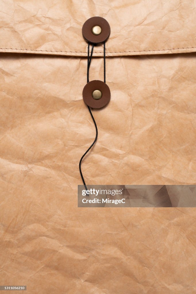 Retro Style Manila Envelope Sealed with Buttons and String