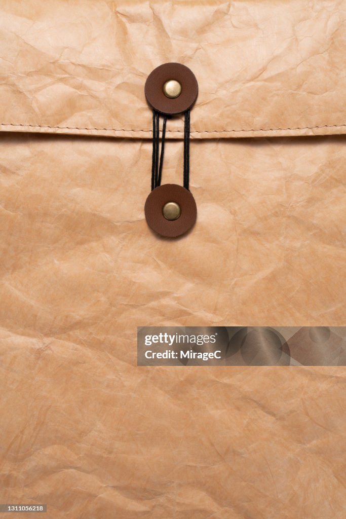Retro Style Manila Envelope Sealed with Buttons and String