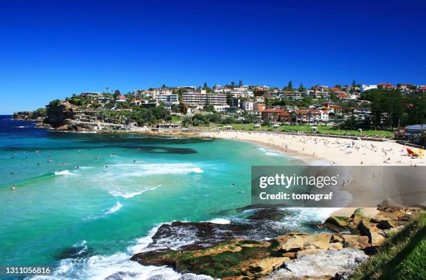 bronte beach in sydney, australia - bondi beach sand stock pictures, royalty-free photos & images