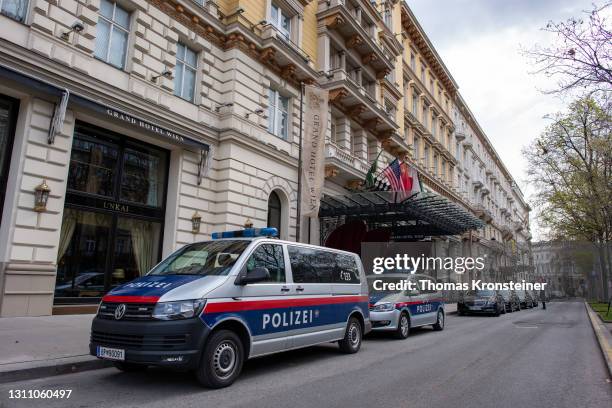 Austrian police officers guard the Grand Hotel on the day the Iran nuclear talks are to resume there on April 06, 2021 in Vienna, Austria....