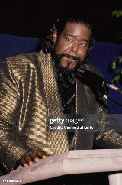 American singer-songwriter Barry White , wearing a gold jacket with a black shirt, addresses the 21st Annual NAACP Image Awards, held at the Wiltern...