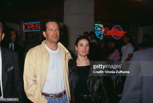 American actor Bruce Willis and his wife, American actress Demi Moore attend the premiere of 'Chances Are' held at the Mann Bruin Theatre in Los...