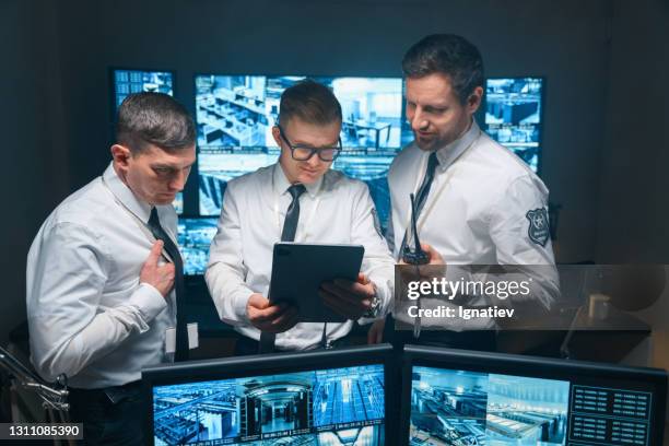 Guard Using Tablet 134 Security Guard Tablet Stock Photos, High-Res Pictures, and Images ...