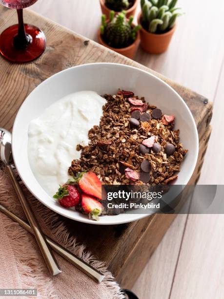homemade granola with yogurt and fresh strawberry, breakfast fruits yogurt with strawberries, roasted granola, - granola stock pictures, royalty-free photos & images
